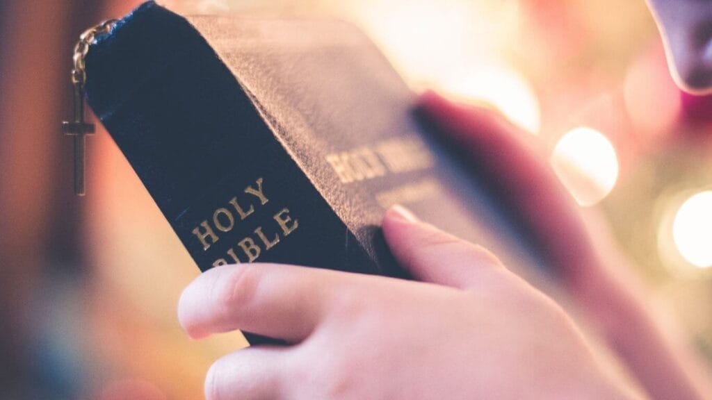 Holding A Bible